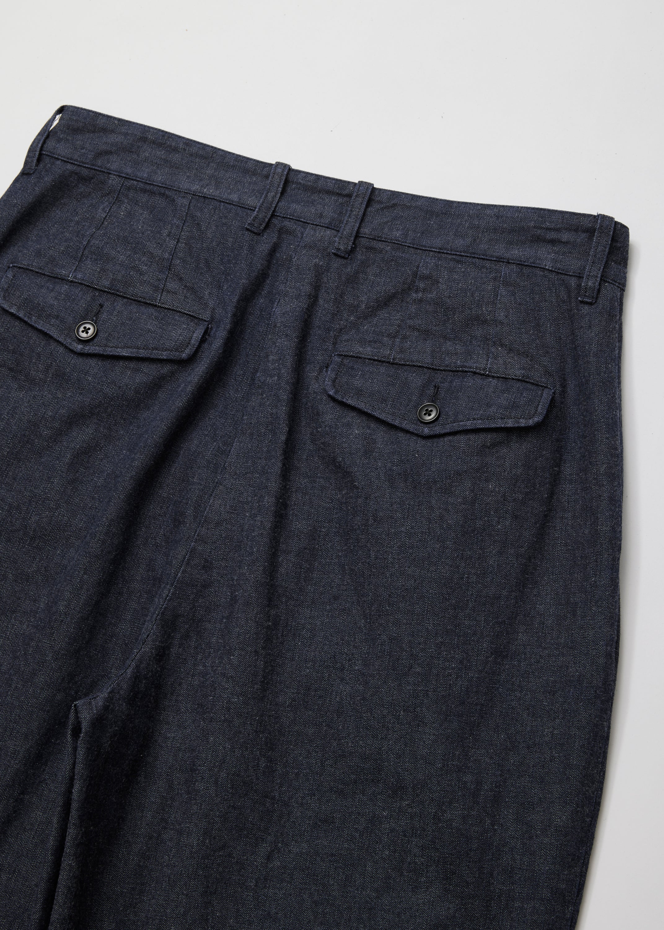 WASHED LIGHT DENIM TUCKED TROUSERS